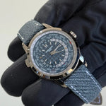 2025 PP5330G-001 World Time Date Blue Dial / White Gold / 40mm / Hand-Stitched Calf Skin Denim Pattern Strap / Brand New & Unworn Just Watch It
