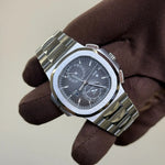 2016 Patek Philippe 5990/1A Nautilus Flyback Chronograph Travel Time / Grey Dial / Steel / Mint Condition / Box & Papers Just Watch It