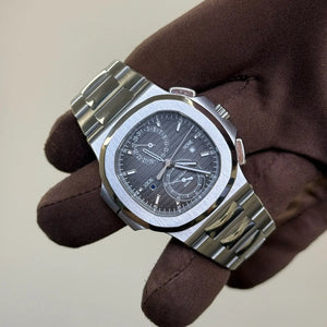 2016 Patek Philippe 5990/1A Nautilus Flyback Chronograph Travel Time / Grey Dial / Steel / Mint Condition / Box & Papers Just Watch It