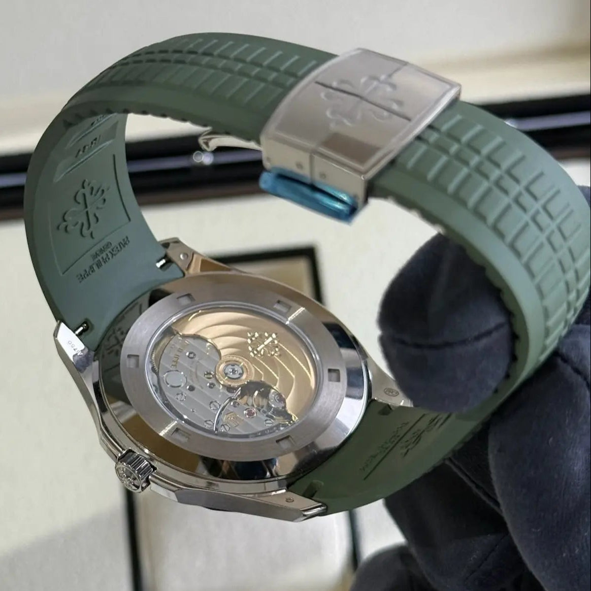 2025 Patek Philippe Aquanaut Green / 5168G-010 / White Gold on Green Rubber Strap / 42.2 mm / Brand New & Unworn - Just Watch It