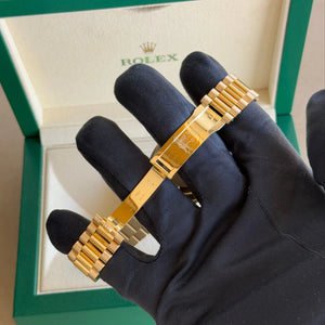2025 Rolex Day Date 40 Mother of Pearl Baguette Diamond Dial 228238 / Yellow Gold / Brand New & Unworn - Justwatchit